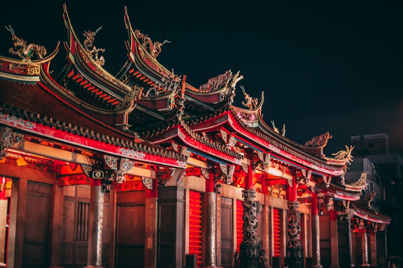 Vibrant city nightlife in Asia with people engaging with digital platforms on their mobile devices